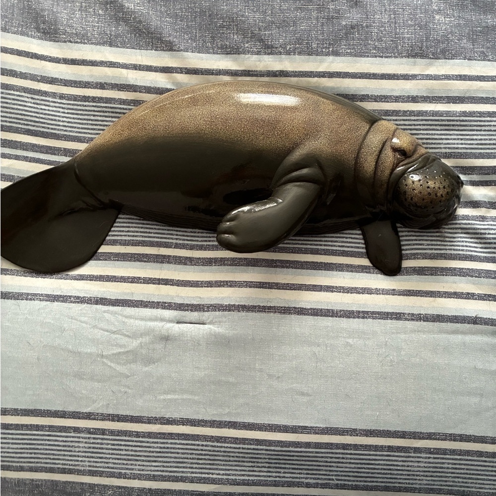 Elegant Dark Brown Manatee Figurine